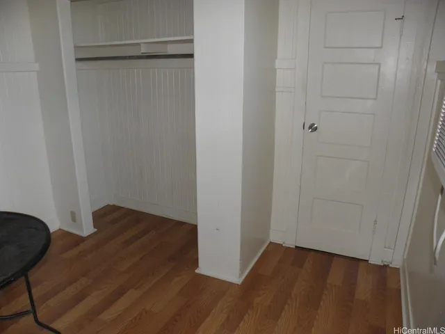 a utility room with a window and a shower