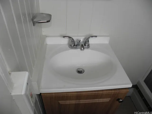 a view of a pathway of a building with wooden floor