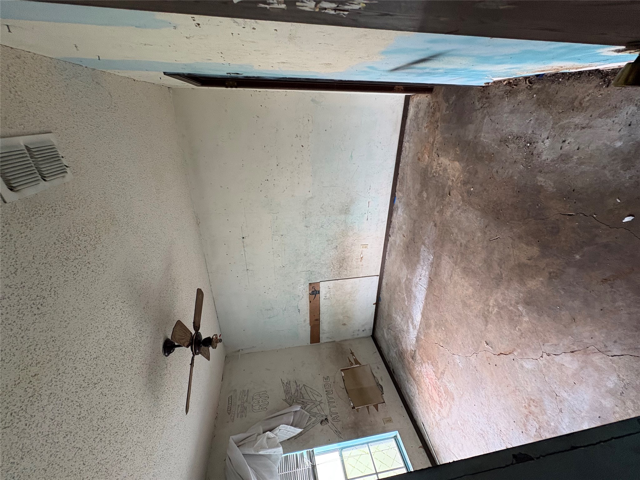 709 Drake Lane Taylor, TX 76574 - Photo 10 of 17 an empty room with windows