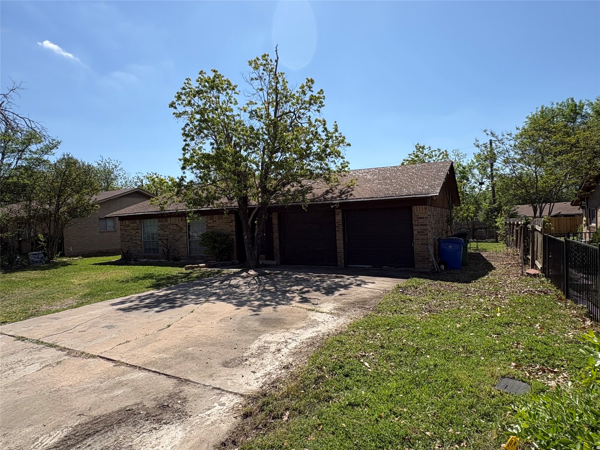 709 Drake Lane Taylor, TX 76574 - Photo 2 of 17 a house view with a backyard space