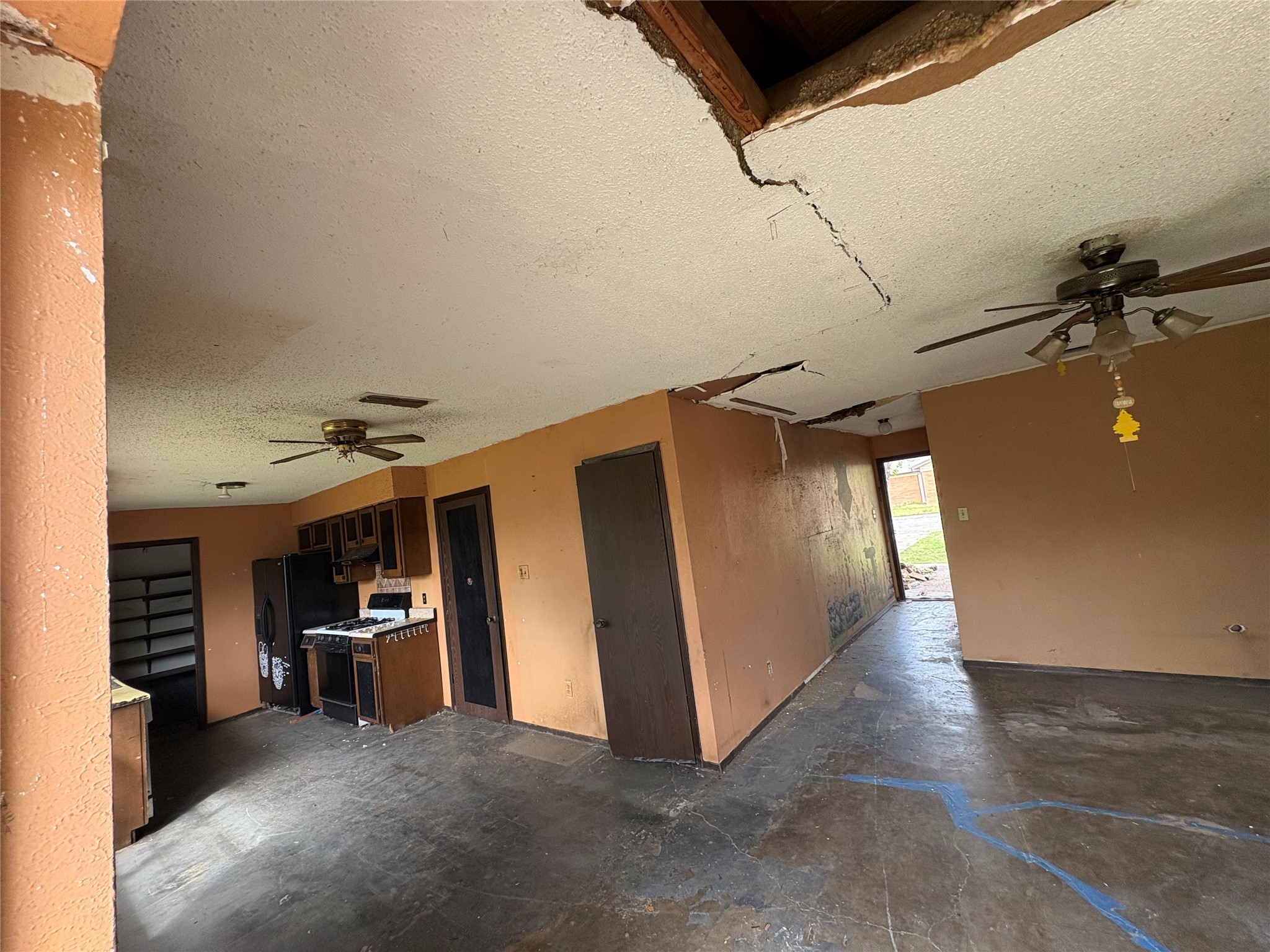 709 Drake Lane Taylor, TX 76574 - Photo 5 of 17 a view of a hallway with workspace