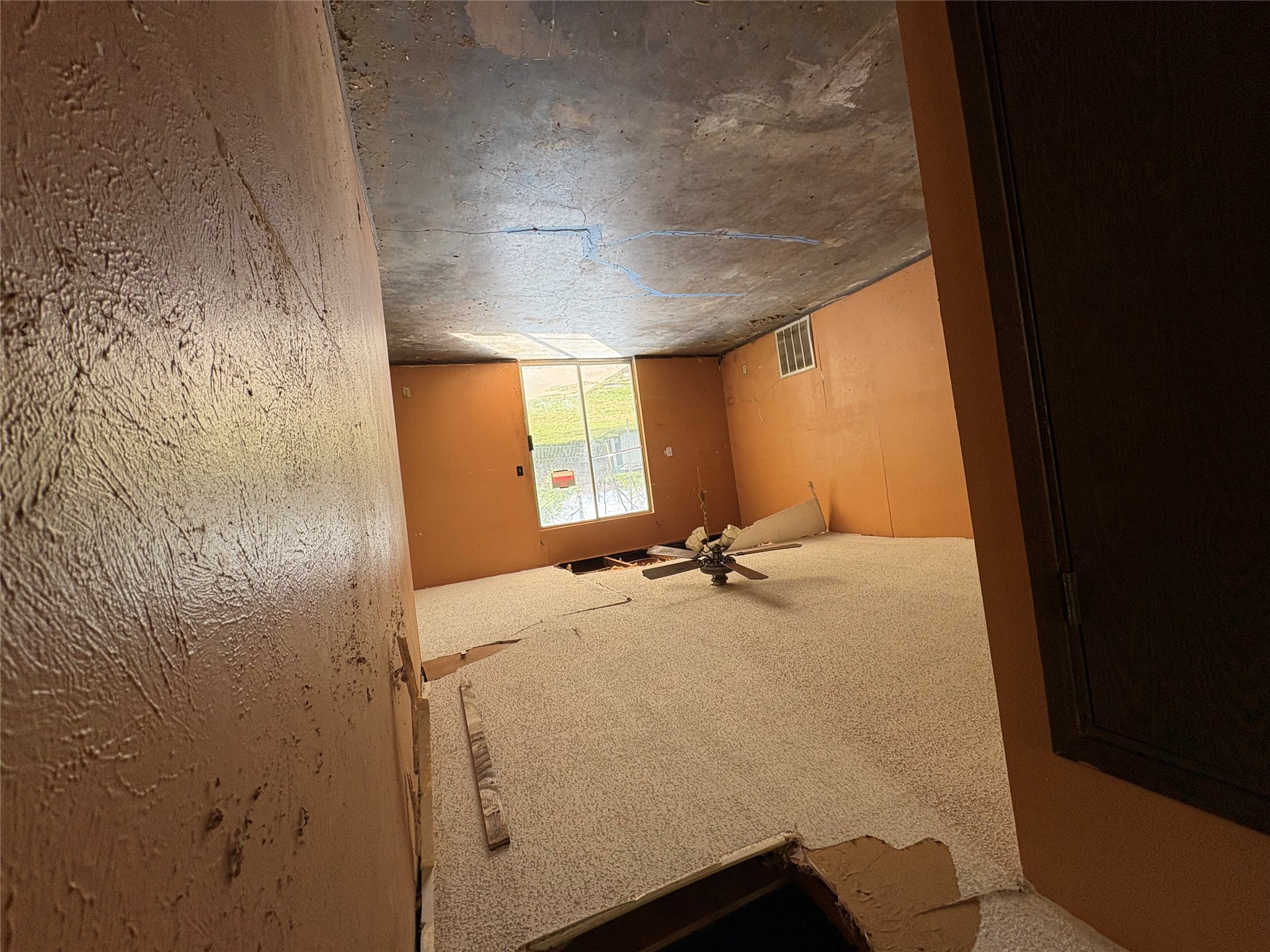 709 Drake Lane Taylor, TX 76574 - Photo 7 of 17 a view of a hallway with a door