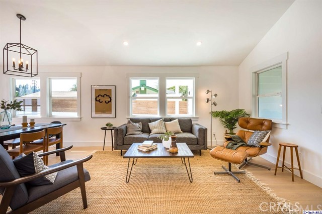 1240 Neola Street Eagle Rock, CA 90041 - Photo 11 of 19 a living room with furniture and wooden floor