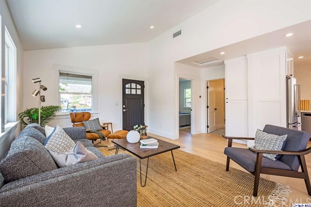 1240 Neola Street Eagle Rock, CA 90041 - Photo 12 of 19 a living room with furniture and wooden floor