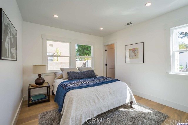 1240 Neola Street Eagle Rock, CA 90041 - Photo 17 of 19 a bedroom with a bed and a window