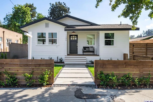 1240 Neola Street Eagle Rock, CA 90041 - Photo 2 of 19 a front view of a house with garden