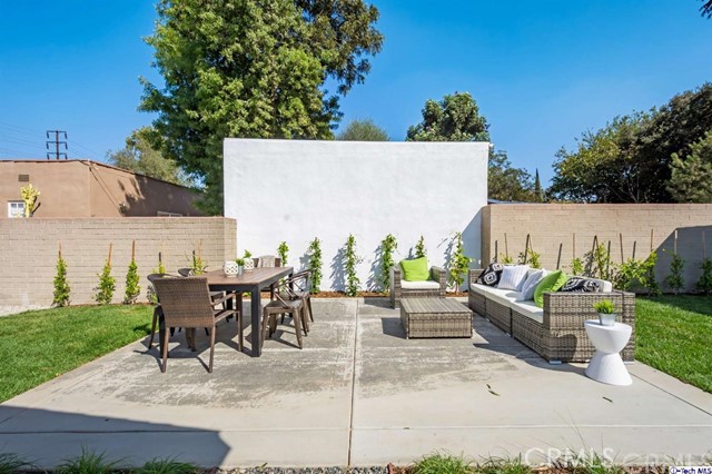 1240 Neola Street Eagle Rock, CA 90041 - Photo 5 of 19 a view of a patio with a table and chairs