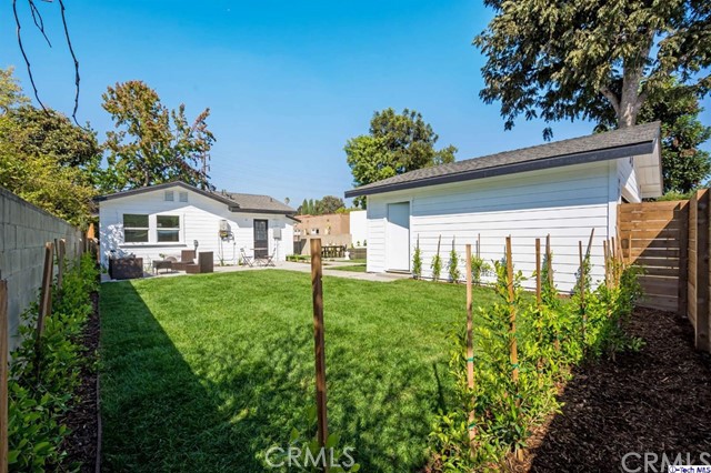 1240 Neola Street Eagle Rock, CA 90041 - Photo 6 of 19 a view of a house with backyard and garden