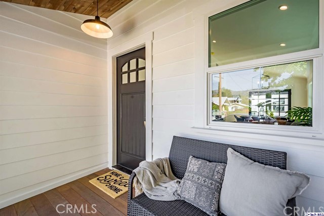 1240 Neola Street Eagle Rock, CA 90041 - Photo 7 of 19 a view of a livingroom with furniture and windows