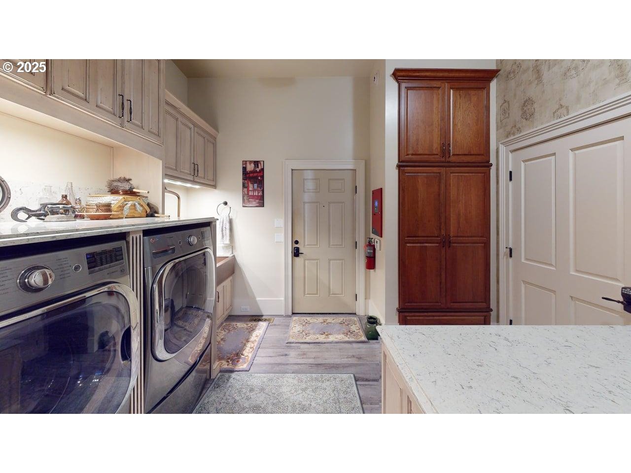 706 West Steuben Street Bingen, WA 98605 - Photo 2 of 32 a bathroom with a sink a washer and dryer