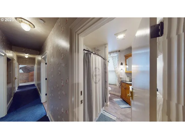 a black and white photo of a living room