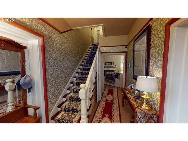 a black and white photo of a living room