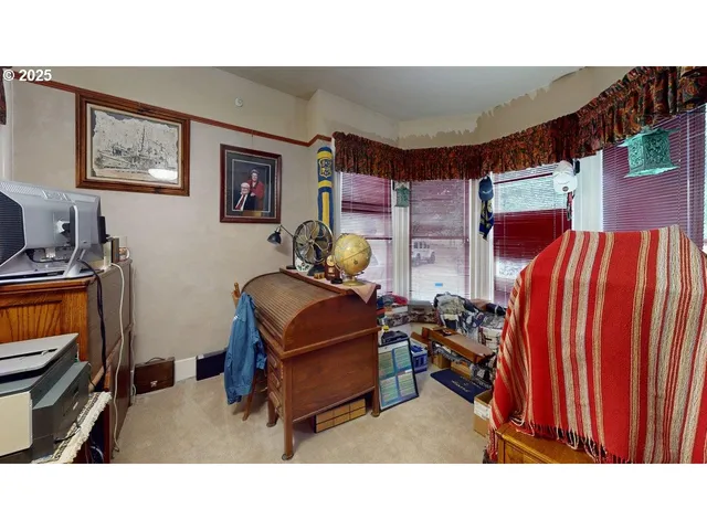 a living room with lots of furniture and gym equipment