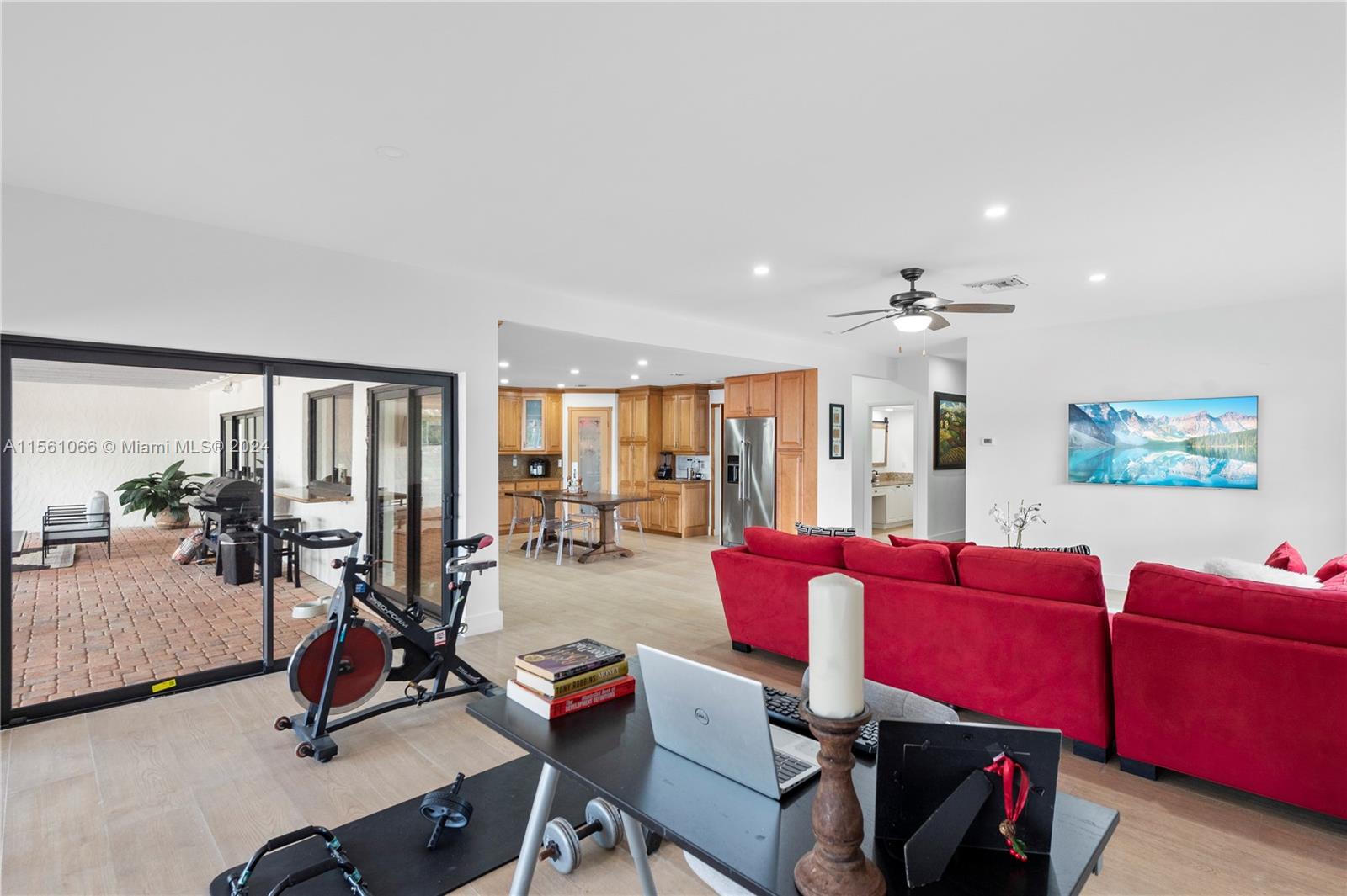 501 Ranch Road Weston, FL 33326 - Photo 18 of 50 a view of a livingroom with workspace and a couch
