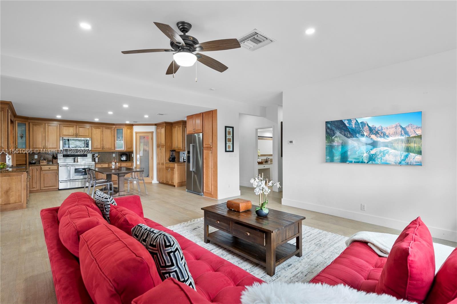 501 Ranch Road Weston, FL 33326 - Photo 19 of 50 a living room with furniture and kitchen view