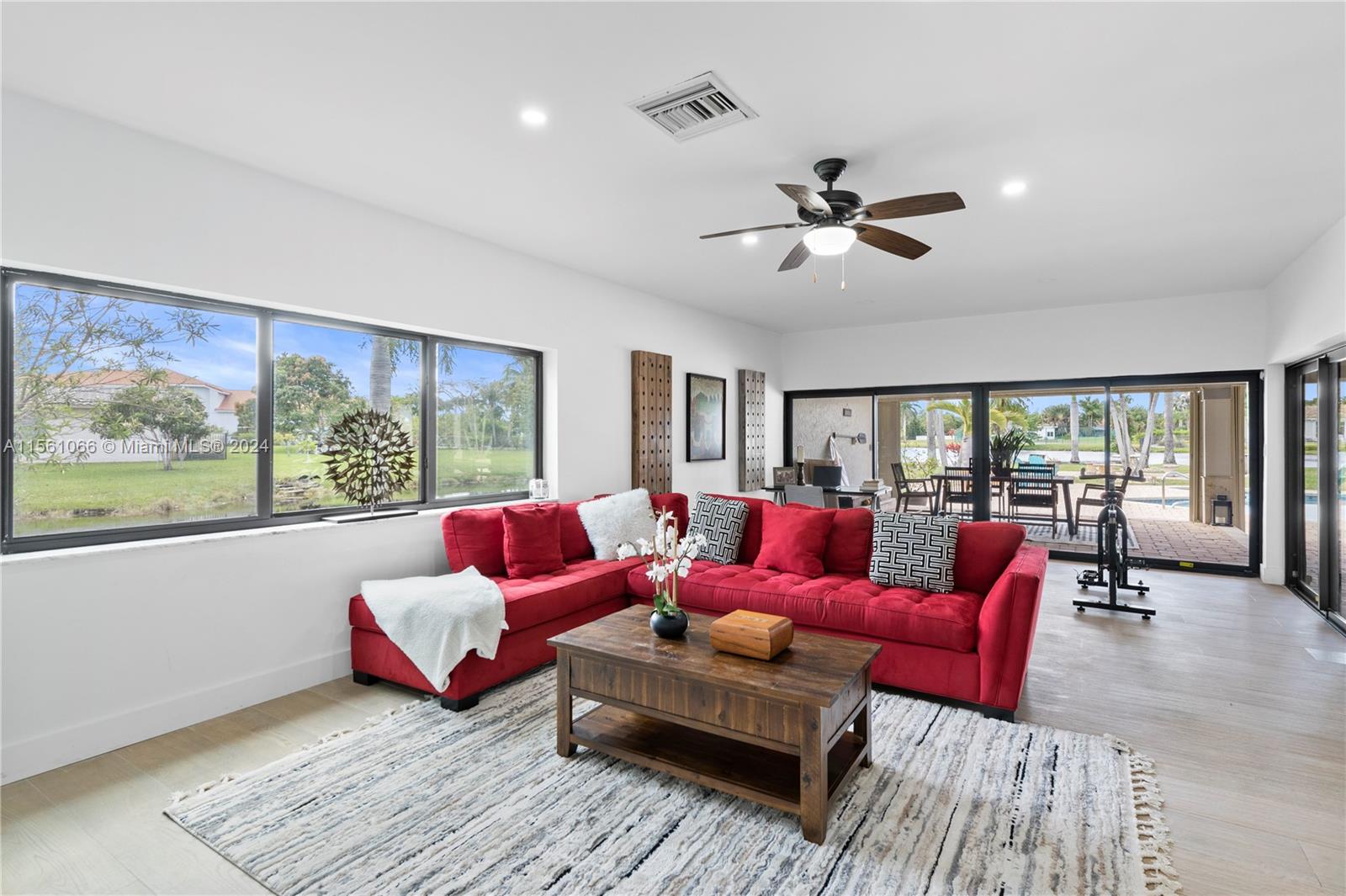 501 Ranch Road Weston, FL 33326 - Photo 20 of 50 a living room with furniture and a large window