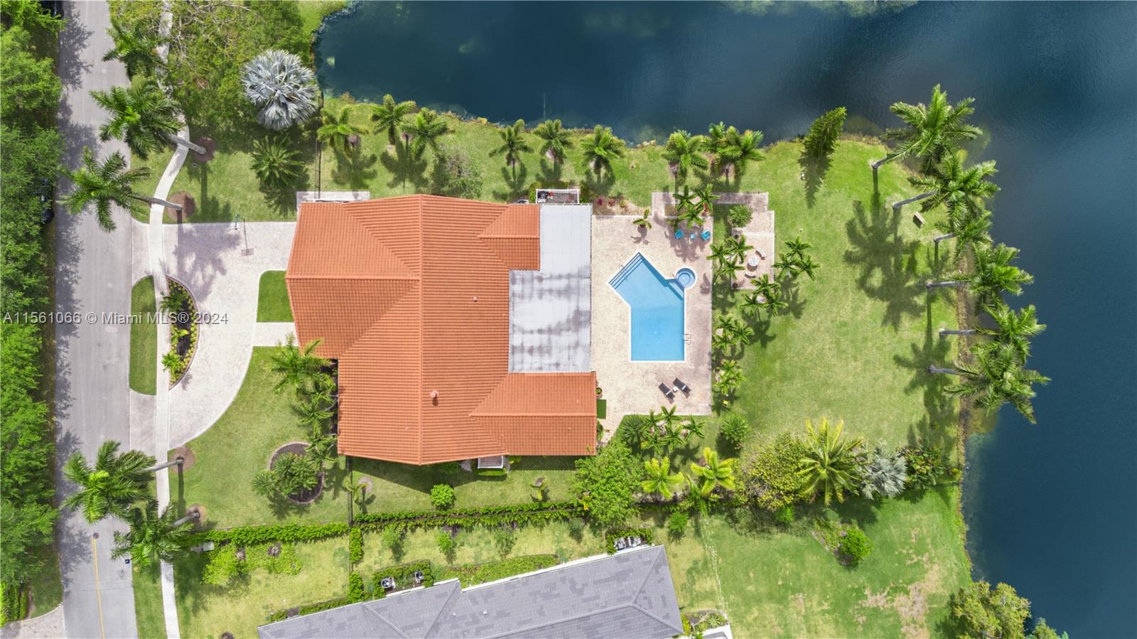 501 Ranch Road Weston, FL 33326 - Photo 2 of 50 an aerial view of a house with a yard and plants