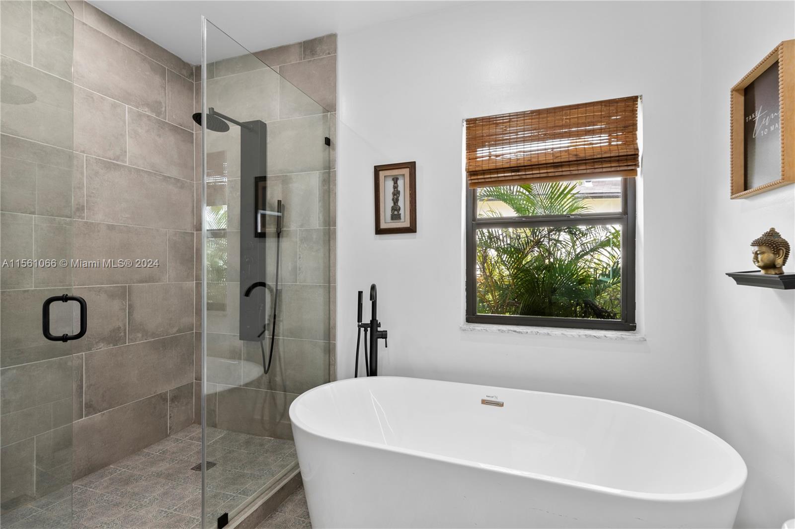 501 Ranch Road Weston, FL 33326 - Photo 27 of 50 a white bath tub sitting next to a shower