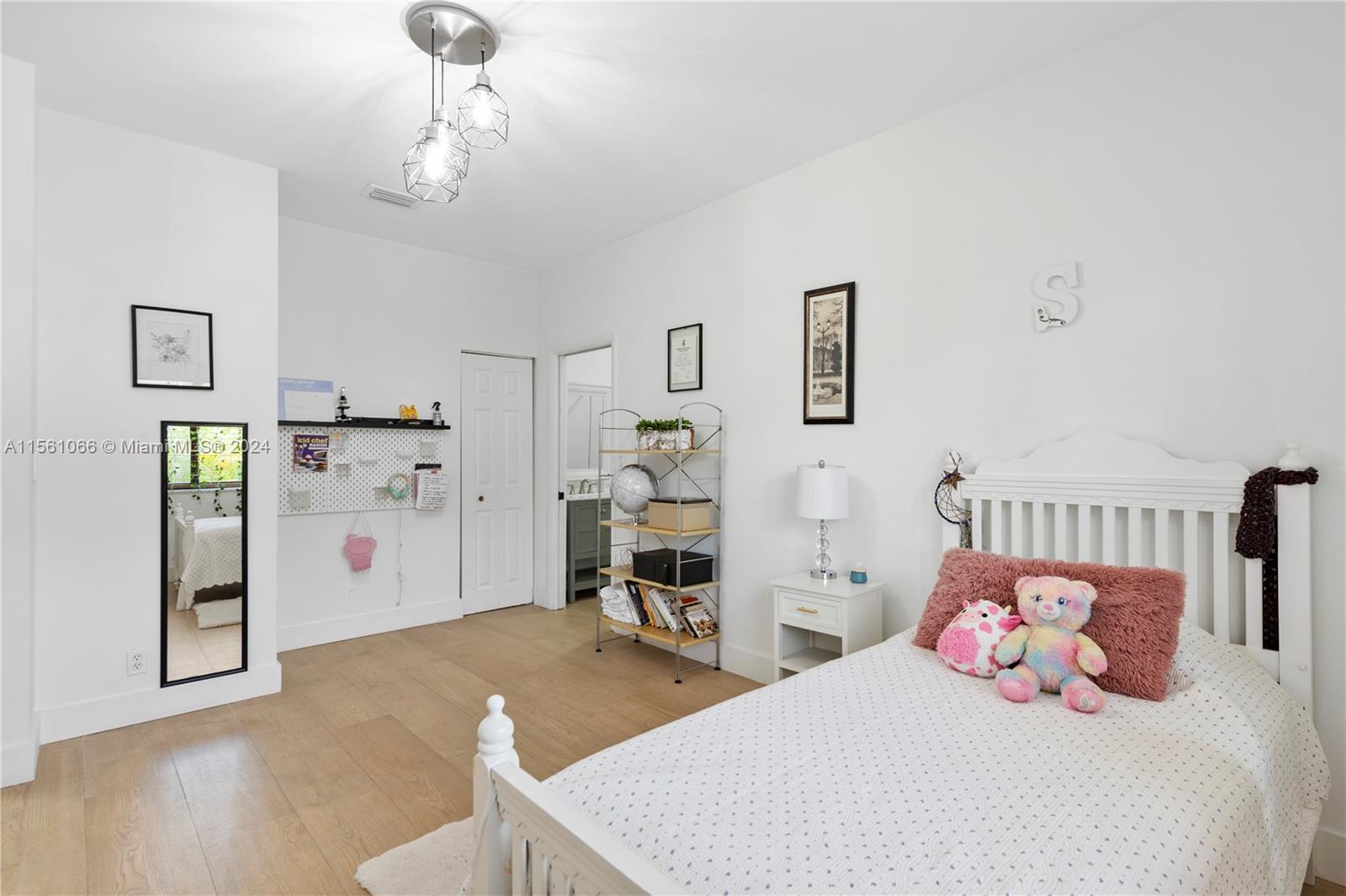 501 Ranch Road Weston, FL 33326 - Photo 30 of 50 a bedroom with a bed and a view of kitchen