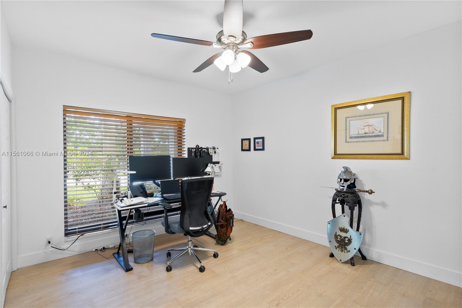501 Ranch Road Weston, FL 33326 - Photo 35 of 50 a view of a workspace with furniture and a window