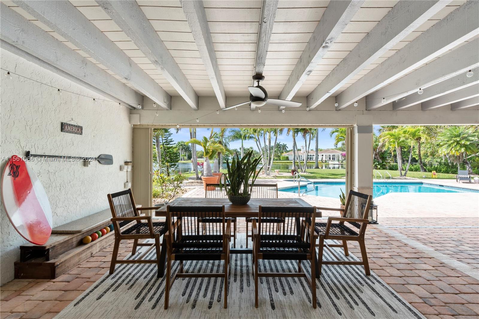 501 Ranch Road Weston, FL 33326 - Photo 42 of 50 a view of a dining room with furniture window and outside view