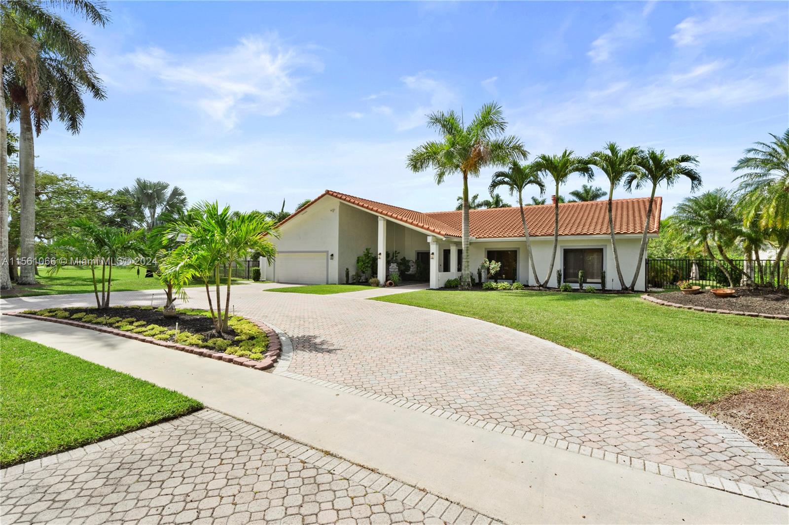 501 Ranch Road Weston, FL 33326 - Photo 50 of 50 a front view of house with yard and green space