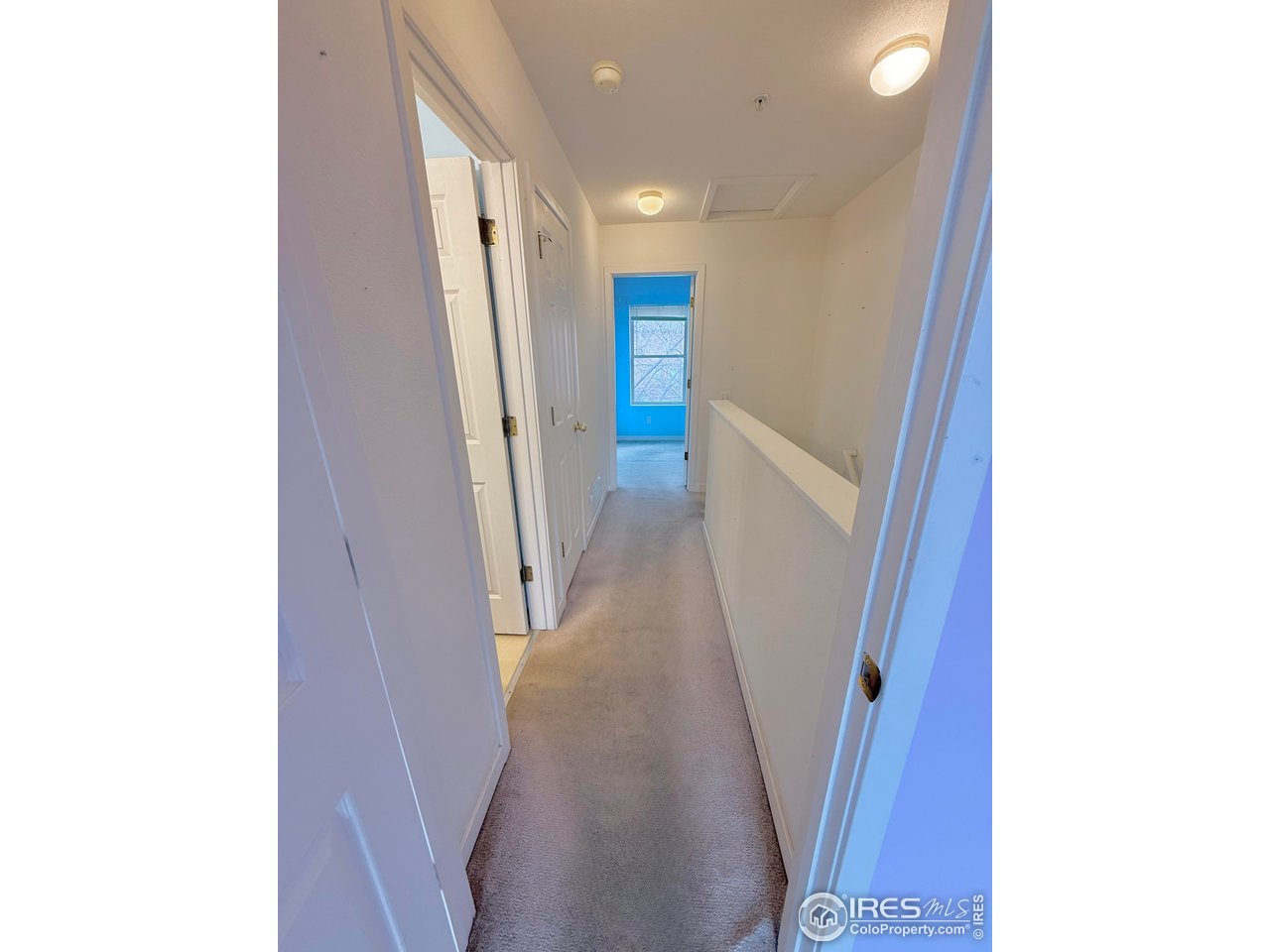 4621 18th Street Boulder, CO 80304 - Photo 9 of 22 a view of a hallway with staircase