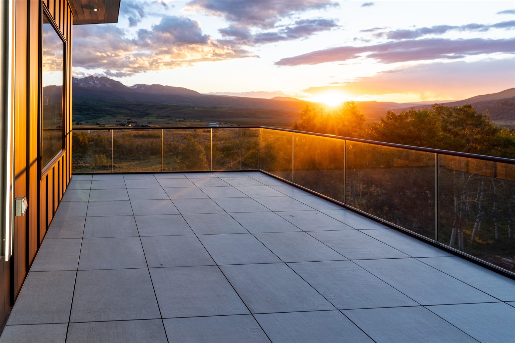 2150 Elk Run Road Silverthorne, CO 80498 - Photo 23 of 29 Patio terrace at dusk featuring a mountain view and a balcony