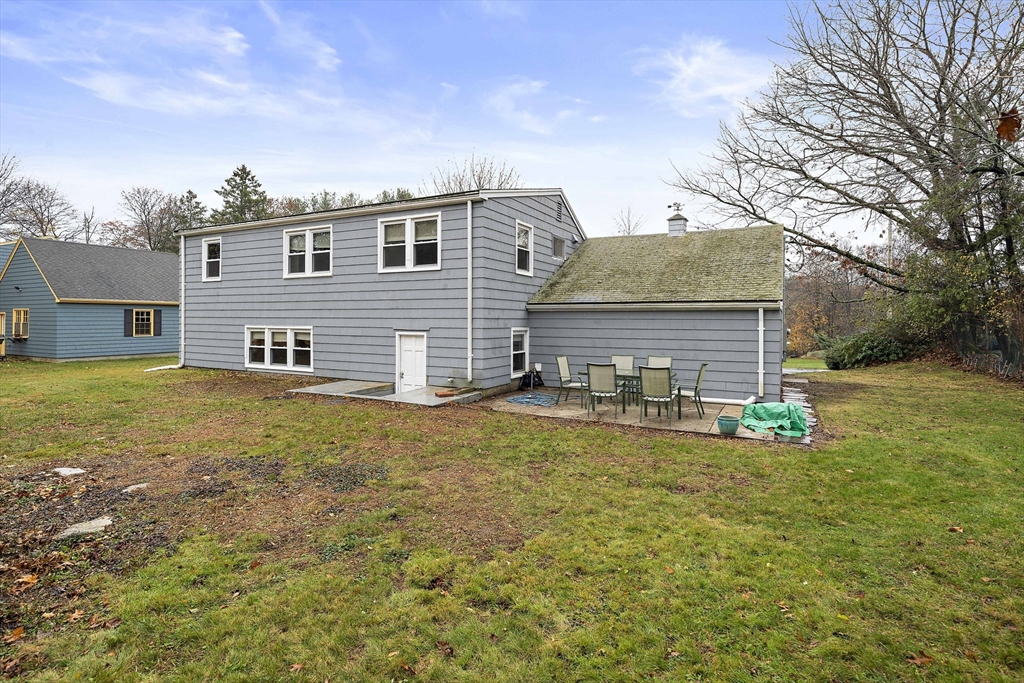 12 Stellar Road Braintree, MA 02184 - Photo 22 of 25 a view of a house with pool and chairs