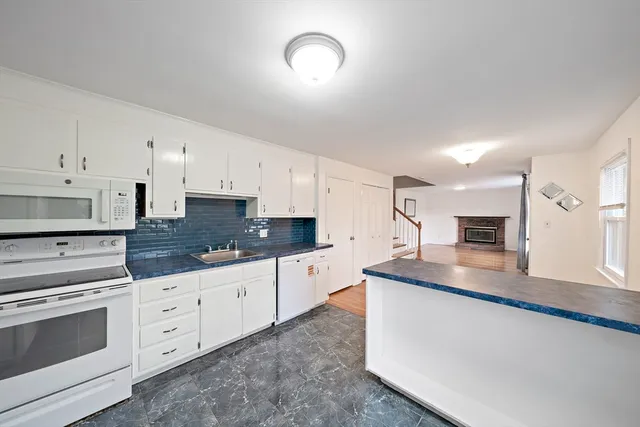 a large kitchen with cabinets
