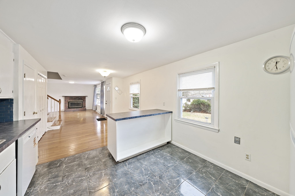 12 Stellar Road Braintree, MA 02184 - Photo 6 of 25 a view of a living room hardwood floor and a kitchen