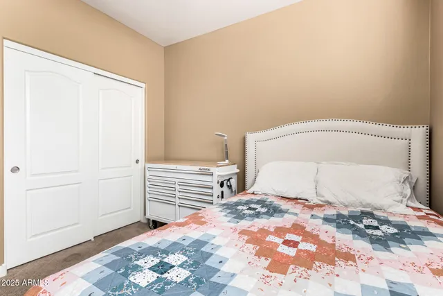 a bathroom with a sink a toilet and shower curtain