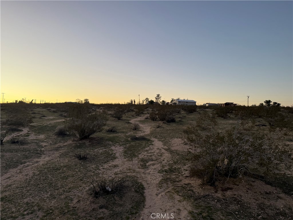 0 Campanula Street Joshua Tree, CA 92252 - Photo 11 of 20 a view of a house with a mountain