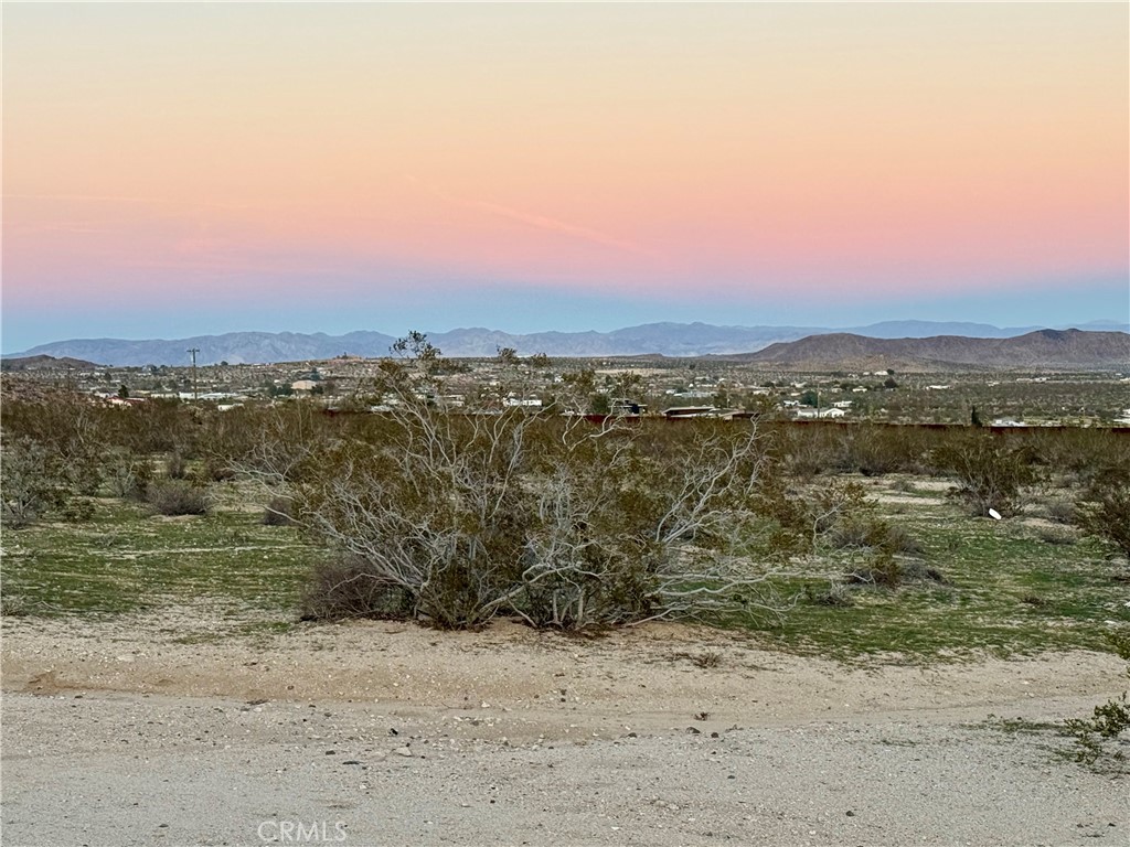 0 Campanula Street Joshua Tree, CA 92252 - Photo 6 of 20 a view of a lake with mountain