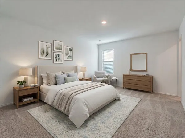a bedroom with a bed and a night stand