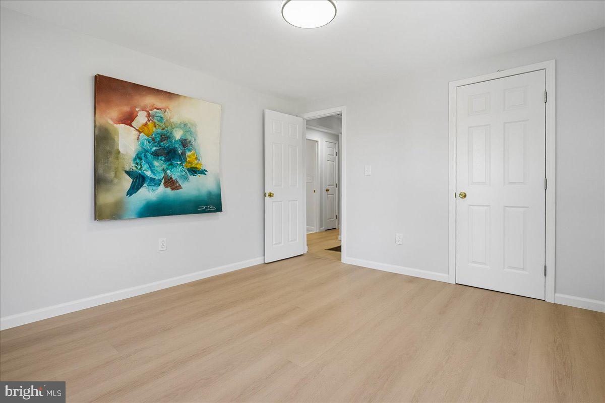 523 Widewater Road Stafford, VA 22554 - Photo 28 of 57 a view of an empty room with wooden floor and window