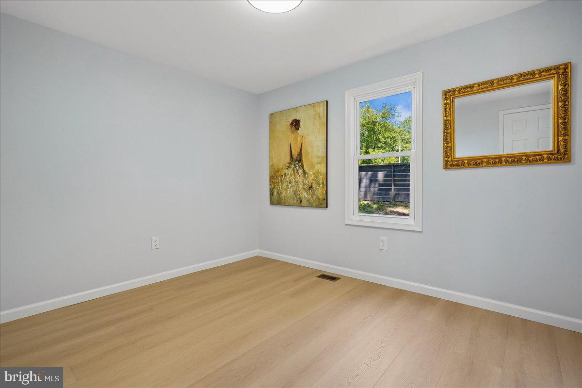 523 Widewater Road Stafford, VA 22554 - Photo 33 of 57 a view of an empty room with a window and a window