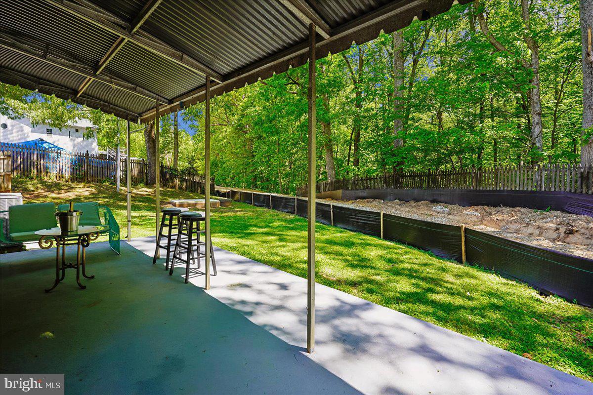 523 Widewater Road Stafford, VA 22554 - Photo 40 of 57 a view of a chair and table on the patio