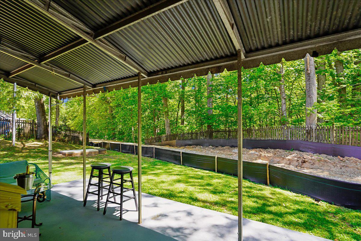 523 Widewater Road Stafford, VA 22554 - Photo 44 of 57 a view of a chair and table in the backyard