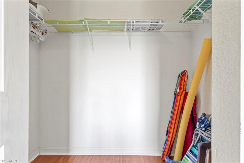 8288 Key Royal Lane, Unit 1435 Naples, FL 34119 - Photo 18 of 26 a view of a closet with storage