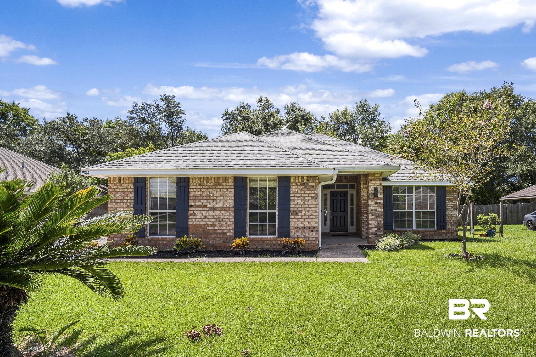 9814 Woolrich Avenue Fairhope, AL 36532 - Photo 1 of 29 Single story home featuring a front lawn