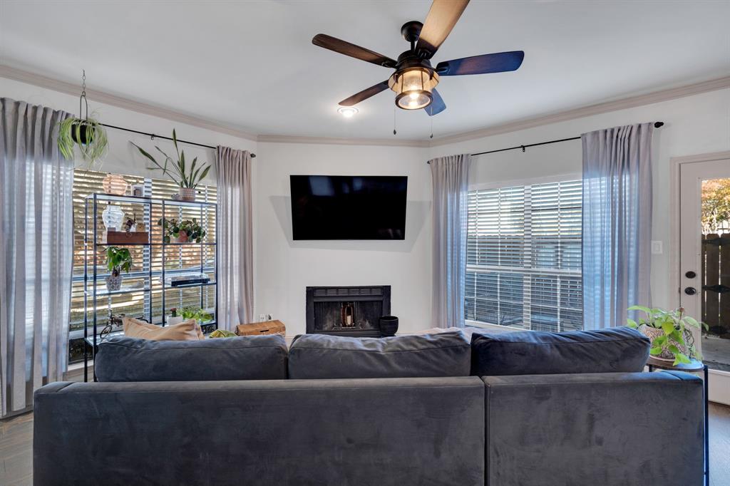 5619 Preston Oaks Road, Unit 802 Dallas, TX 75254 - Photo 14 of 27 a living room with furniture and a flat screen tv