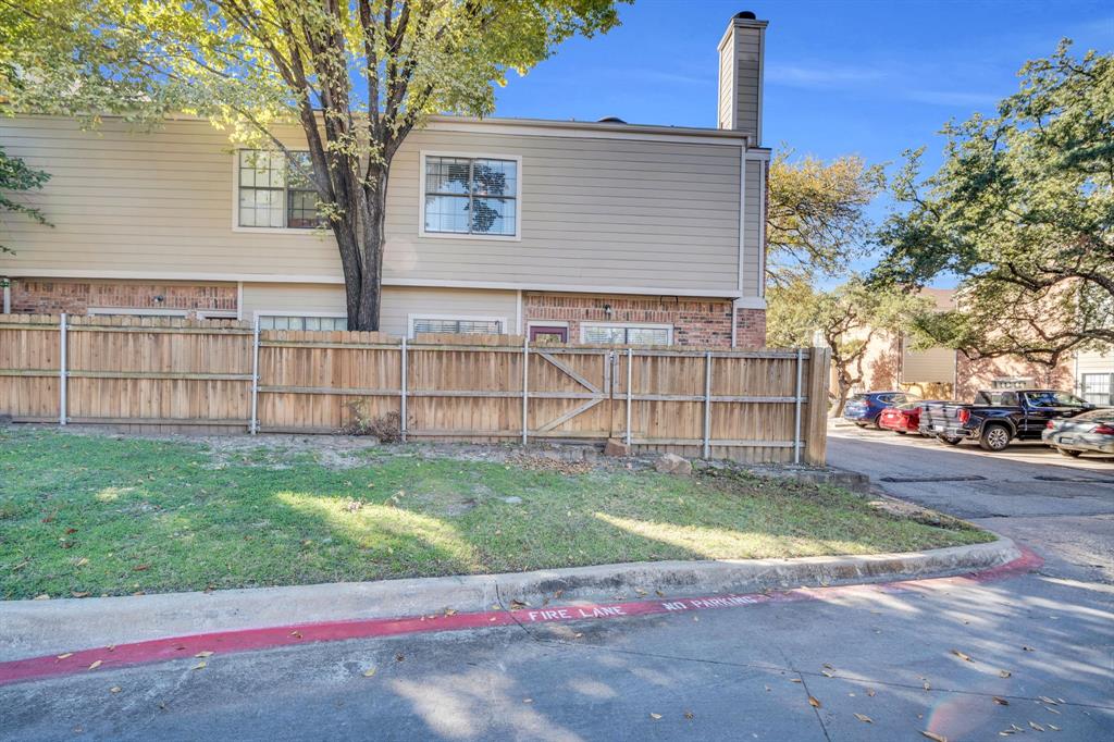 5619 Preston Oaks Road, Unit 802 Dallas, TX 75254 - Photo 27 of 27 a view of a house with a yard
