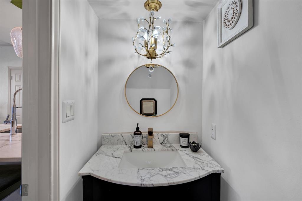 5619 Preston Oaks Road, Unit 802 Dallas, TX 75254 - Photo 4 of 27 a bathroom with a sink and a mirror