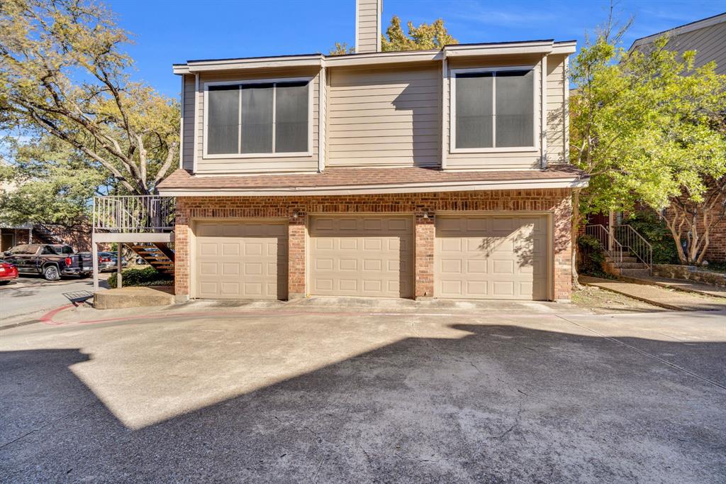 5619 Preston Oaks Road, Unit 802 Dallas, TX 75254 - Photo 6 of 27 a front view of a house with a road