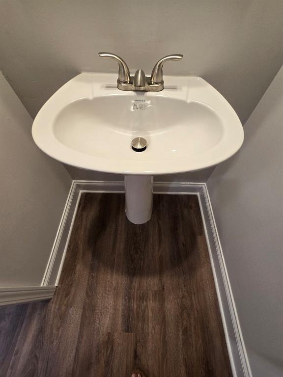 6210 Ripple Way, Unit 90 Atlanta, GA 30349 - Photo 14 of 23 a bathroom with a sink and a mirror