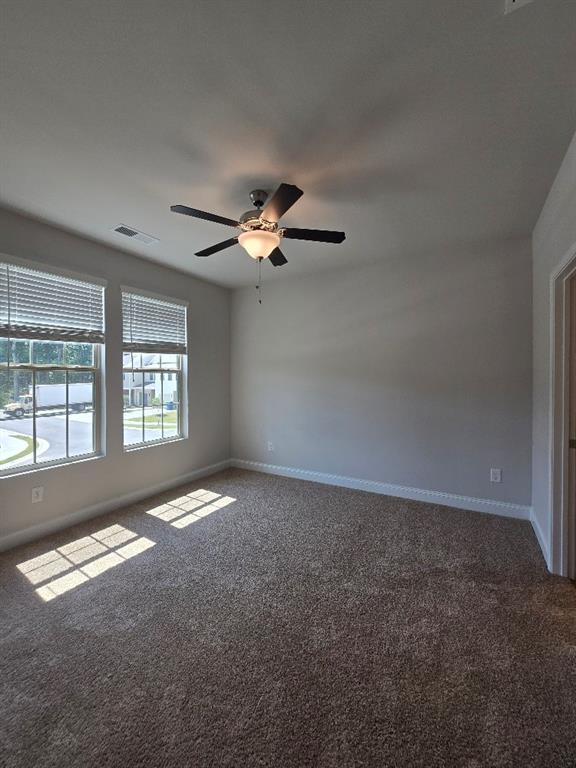 6210 Ripple Way, Unit 90 Atlanta, GA 30349 - Photo 17 of 23 a view of an empty room with a window