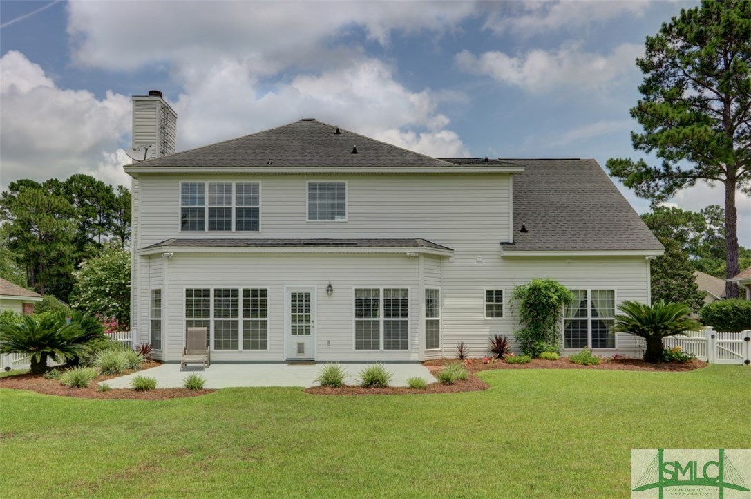 212 Walthour Drive Rincon, GA 31326 - Photo 22 of 30 Extended back patio is perfect for lounging & rela