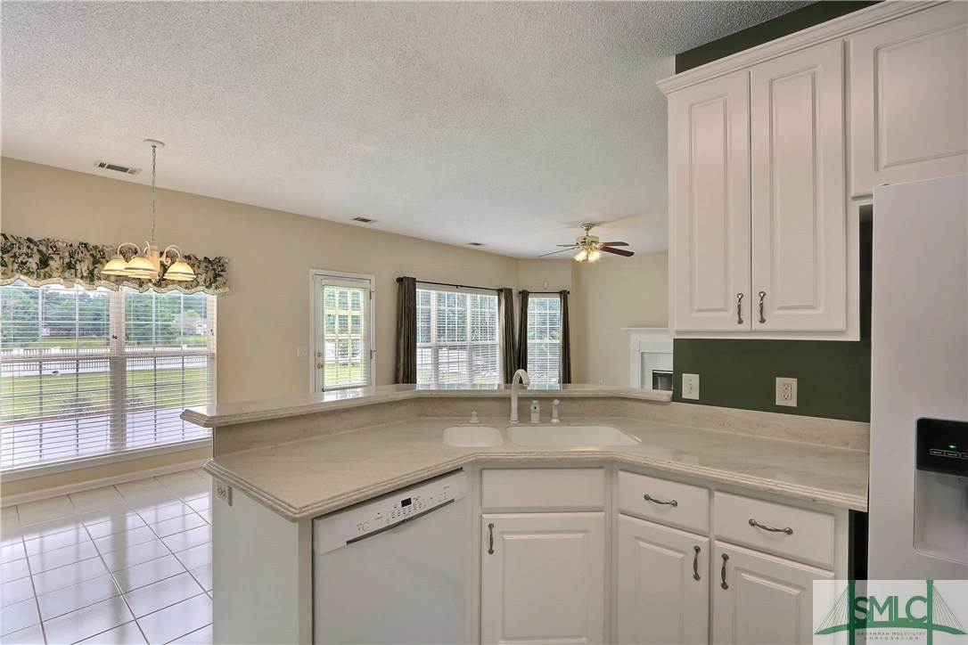 212 Walthour Drive Rincon, GA 31326 - Photo 7 of 30 The kitchen also features tile flooring, new Bosch