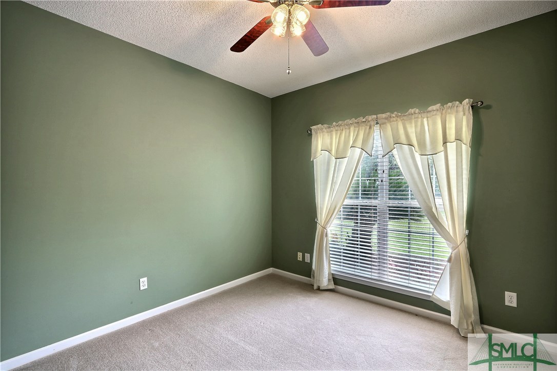 212 Walthour Drive Rincon, GA 31326 - Photo 10 of 30 Full bedroom downstairs with private access to the